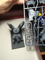 Size comparison between the two-handed axe and a Daemon Prince. This guy is huge.